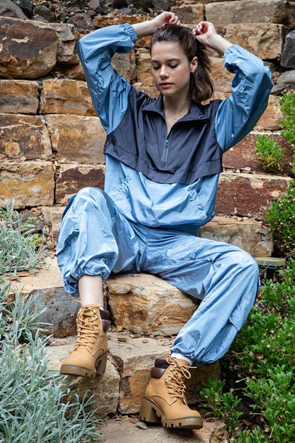 The Dusty Blue Windbreaker