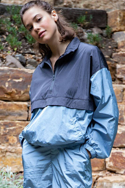 The Dusty Blue Windbreaker